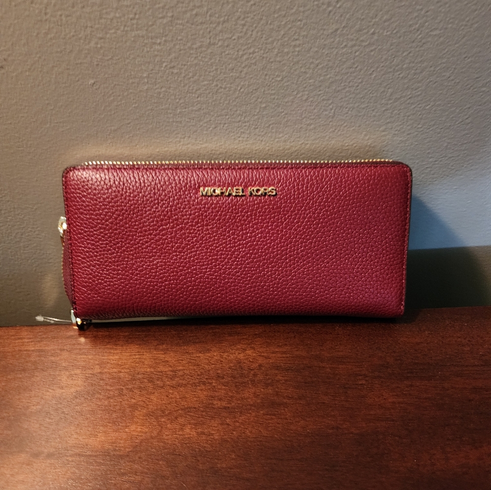 Beautiful Michael Kors deep red leather wallet / wristlet.